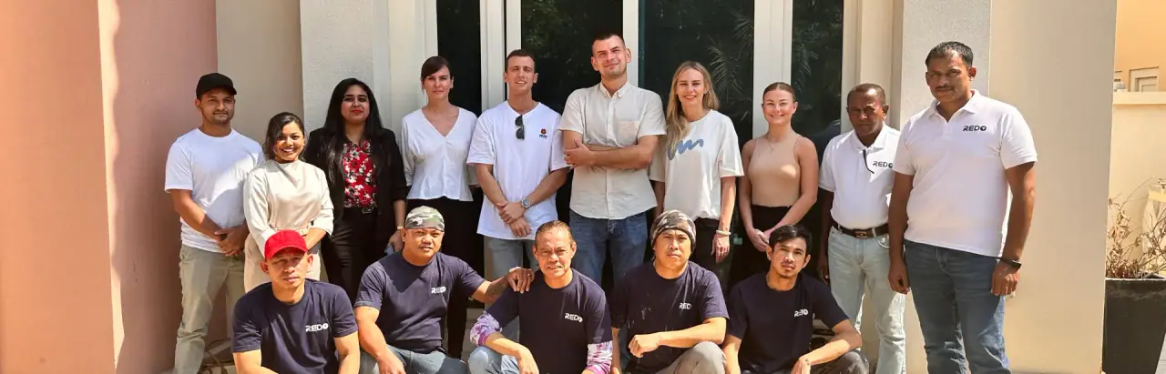 The REDO team in front of a villa in Dubai