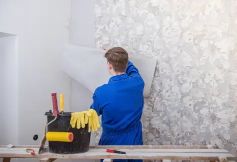 Wallpaper installation and removal services with tools and materials shown